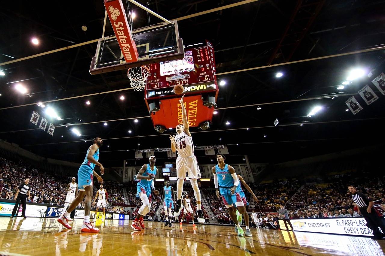 FILE - New Mexico State's Ivan Aurrecoechea shoots against New Mexico during an NCAA college basket...