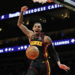 Hawks pull away in 1st half, rout Cavaliers 136-119