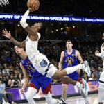 Morant scores 23, Grizzlies rout Nuggets in West showdown