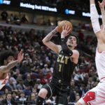 Dosunmu, White lead way as Bulls beat Hornets 114-98
