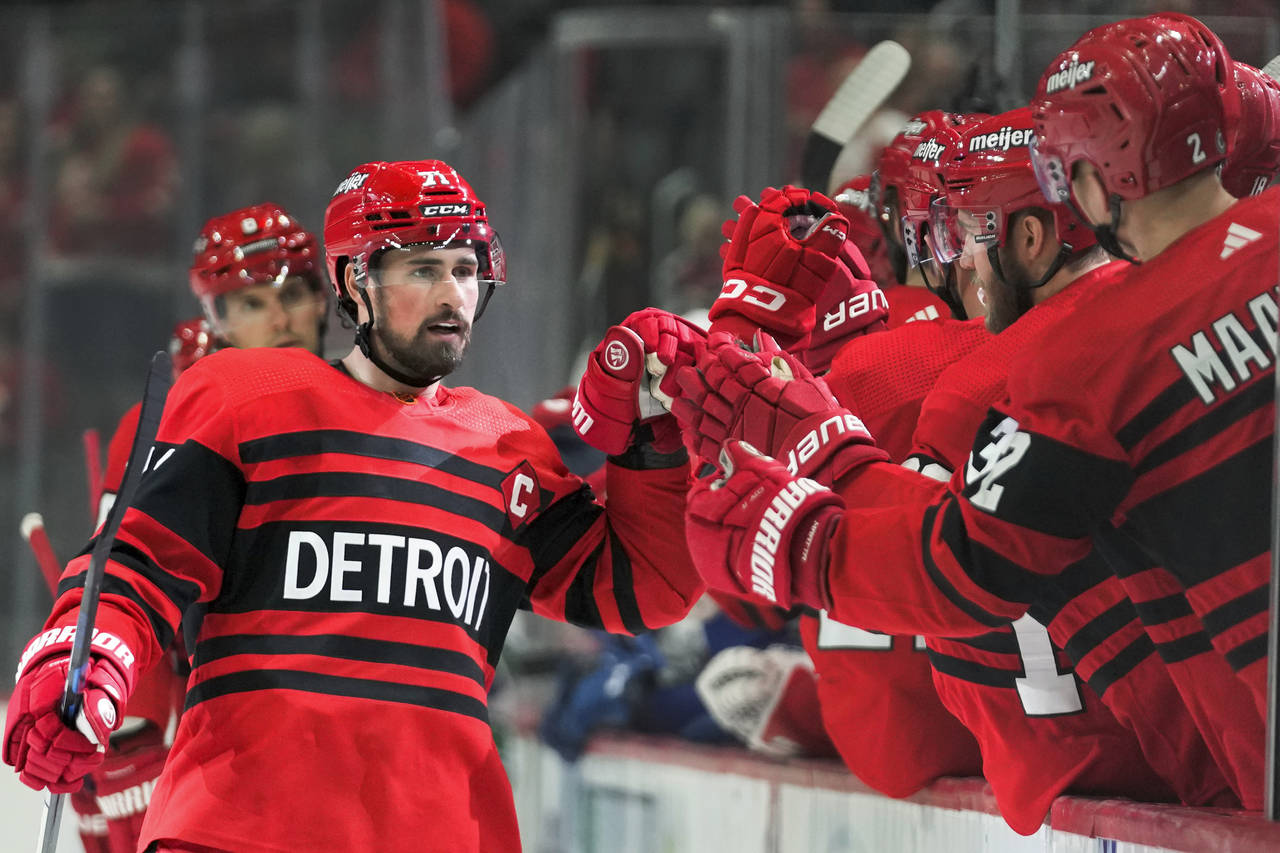 Detroit Red Wings center Dylan Larkin (71) celebrates his goal against the Vancouver Canucks in the...