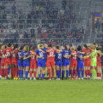 US women beat Canada 2-0, show support in labor dispute