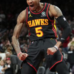 Hawks pull away in 1st half, rout Cavaliers 136-119