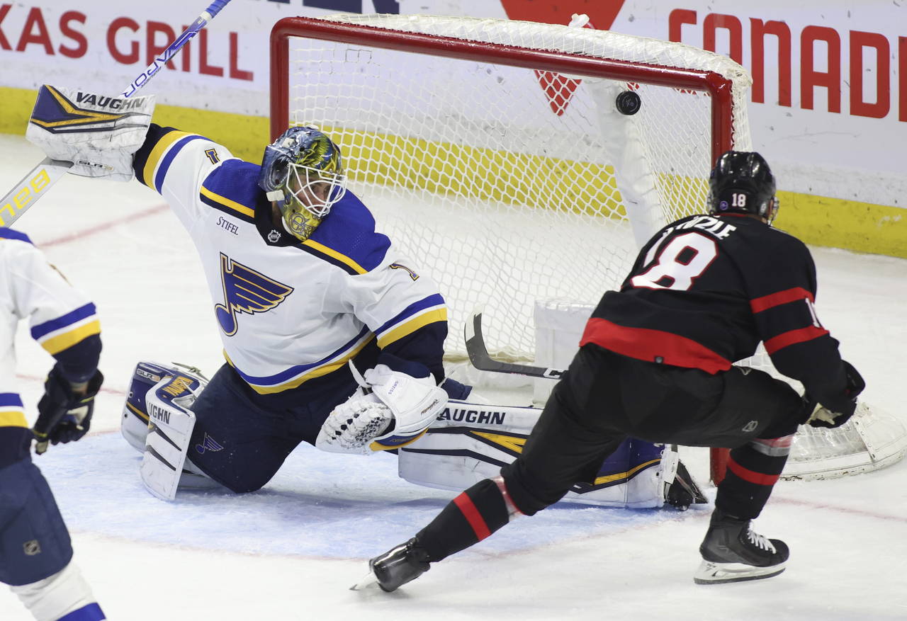 Ottawa Senators Tim Stutzle (18) scores against St. Louis Blues goaltender Thomas Greiss (1) during...