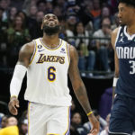 Davis leads rally from 27 down as Lakers beat Mavs 111-108