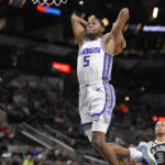 Sabonis' double-double helps Kings power past Spurs 119-109