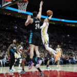 Lillard has triple-double, Blazers rally late past Warriors