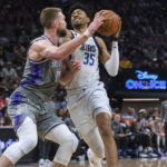 Irving's 25 points, 10 assists lead Mavericks over Kings