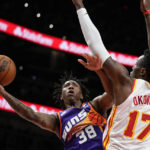 Young scores 36 as Hawks beat short-handed Suns 116-107