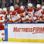 Lafreniere scores in OT to lift Rangers over Flames 5-4
