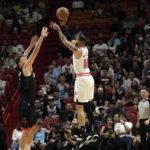 Butler's dunk at end gives Heat 97-95 win over Rockets