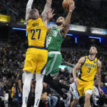 Tatum has 31, breaks tie late in OT, Celtics outlast Pacers