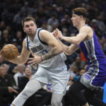 Fox scores 36 points, Kings beat Mavericks 133-128 in OT