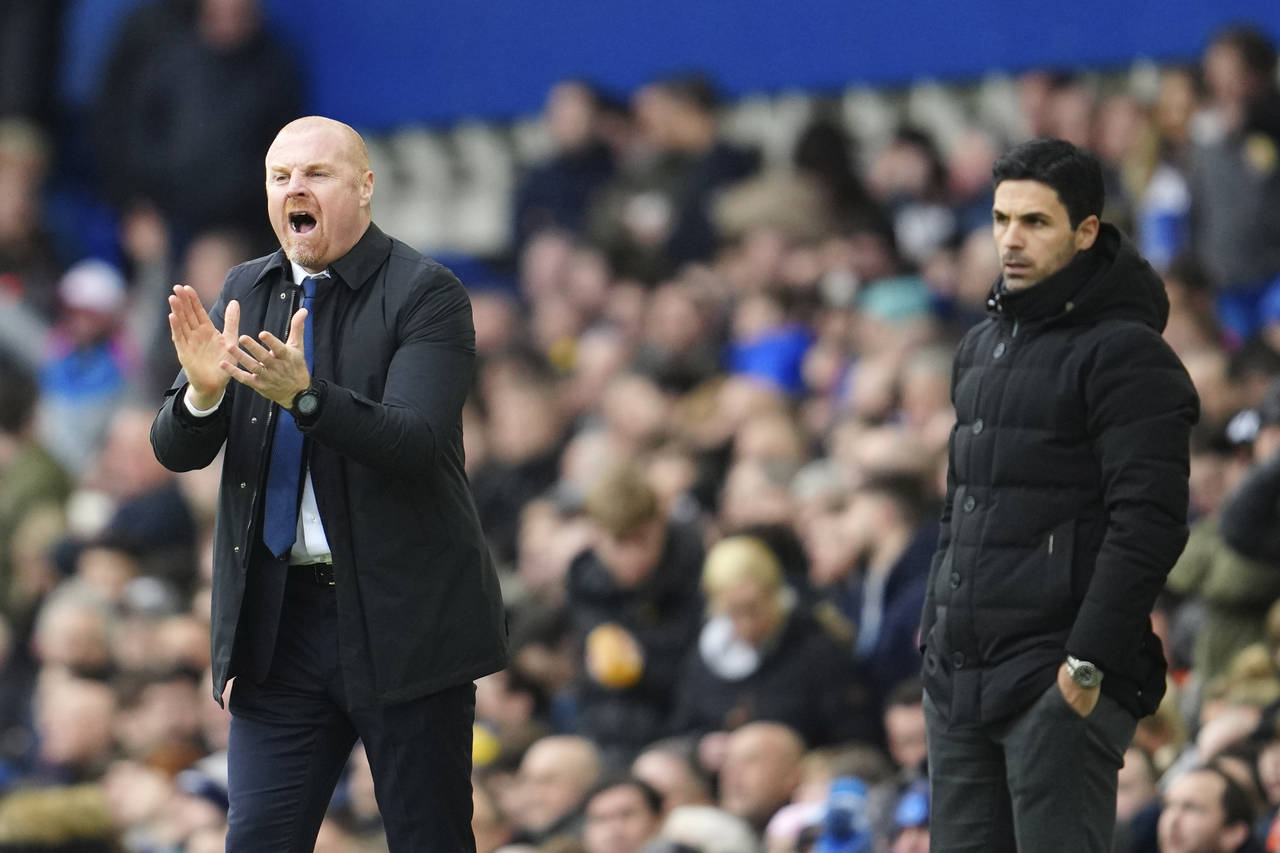 Everton's head coach Sean Dyche, left, and Arsenal's manager Mikel Arteta during the English Premie...