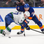 Pettersson scores 2, Canucks beat Isles to snap 2-game skid