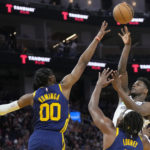 Thompson, Warriors' supporting cast hold off Timberwolves