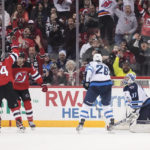 Zetterlund, Wood score in 3rd, Devils rally past Jets 4-2