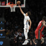 Mikal Bridges scores career-high 45, Nets beat Heat 116-105