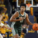 Spartans lose to Michigan in their first game since shooting