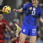 US women beat Canada 2-0, show support in labor dispute