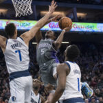 Fox scores 36 points, Kings beat Mavericks 133-128 in OT