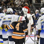 Ukrainians, Bruins celebrate unity arm-in-arm on the ice