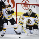 McAvoy scores in OT, Bruins beat Flames as win streak hits 8