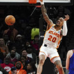 Young scores 36 as Hawks beat short-handed Suns 116-107