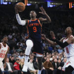 Barrett scores 30, helps Knicks hold off Heat 106-104