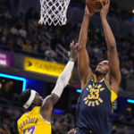 James closes in on scoring record, Lakers rally past Pacers
