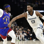 Morant scores 23, Grizzlies rout Nuggets in West showdown