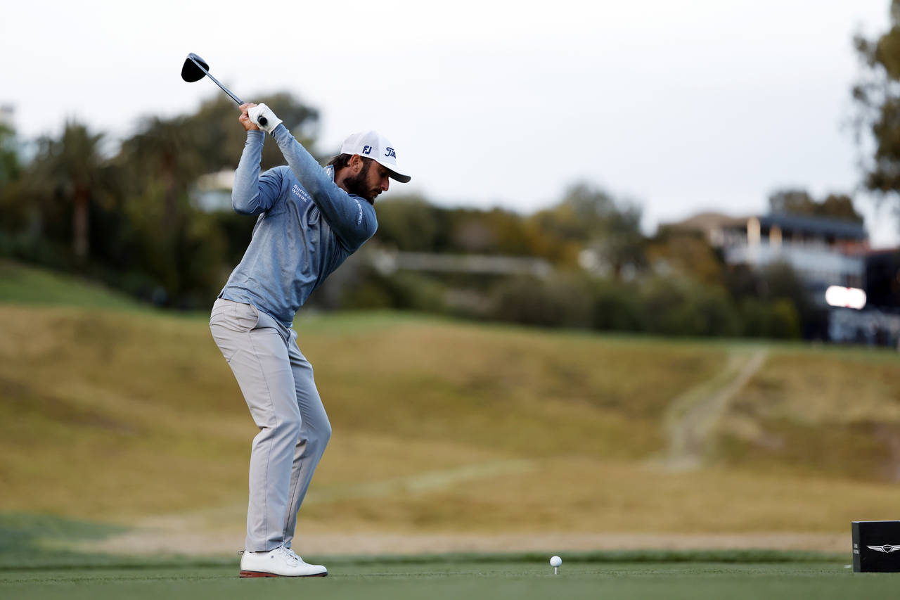 Max Homa hits from the 18th tee during the second round of the Genesis Invitational golf tournament...