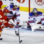 Backlund scores in OT as Flames stop Rangers' win streak