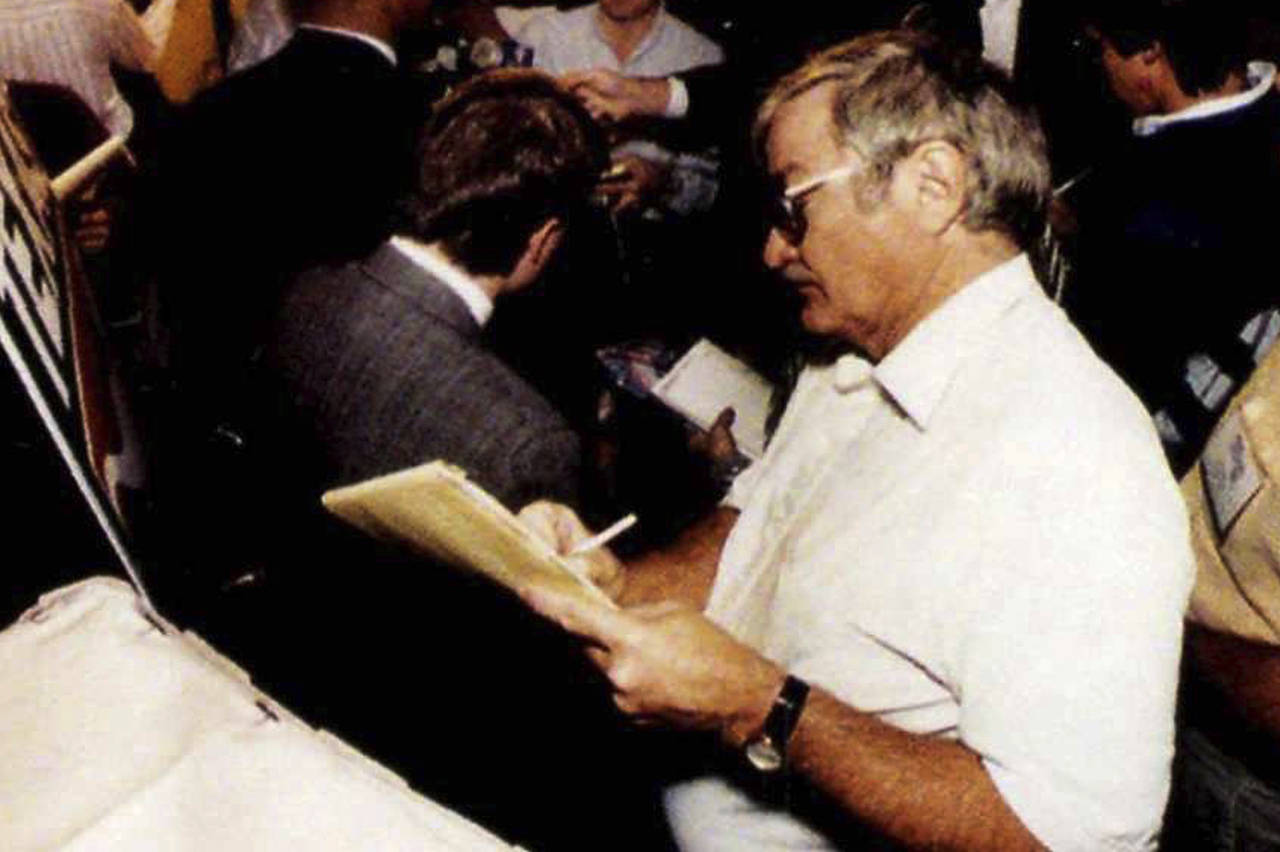 FILE - Texas sports editor, Denne Freeman listens to University of Texas Safety Stanley Richard dur...