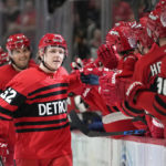 Larkin, Berggren score 2 goals apiece, Wings down Canucks