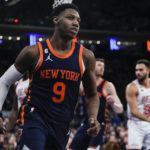Barrett scores 30, helps Knicks hold off Heat 106-104