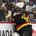 Bruins goaltender Linus Ullmark scores into empty net