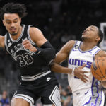Sabonis' double-double helps Kings power past Spurs 119-109