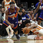 Young scores 36 as Hawks beat short-handed Suns 116-107