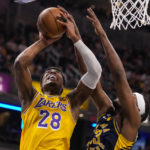 James closes in on scoring record, Lakers rally past Pacers