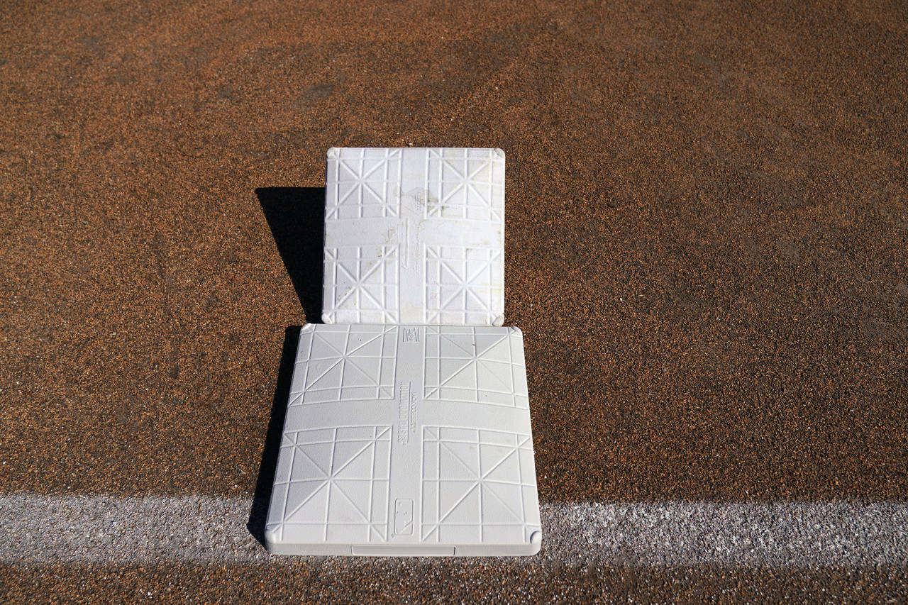 The new, larger base sits next to the older, smaller base at TD Ballpark Wednesday, Feb. 15, 2023, ...