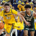 Spartans lose to Michigan in their first game since shooting