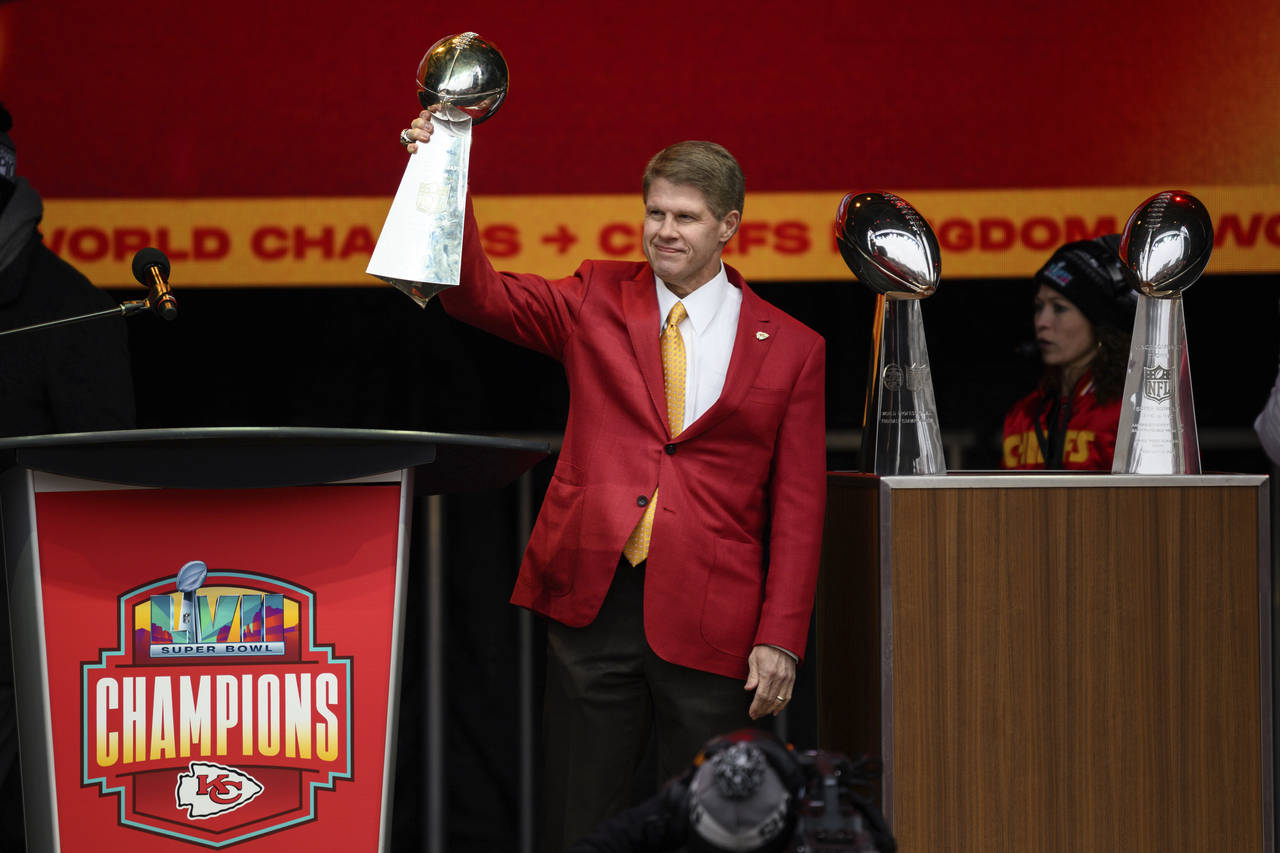 Kansas CIty Chiefs Chairman and CEO Clark Hunt brings out the new Super Bowl trophy to join the fir...