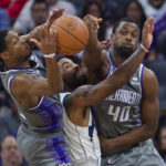 Fox scores 36 points, Kings beat Mavericks 133-128 in OT