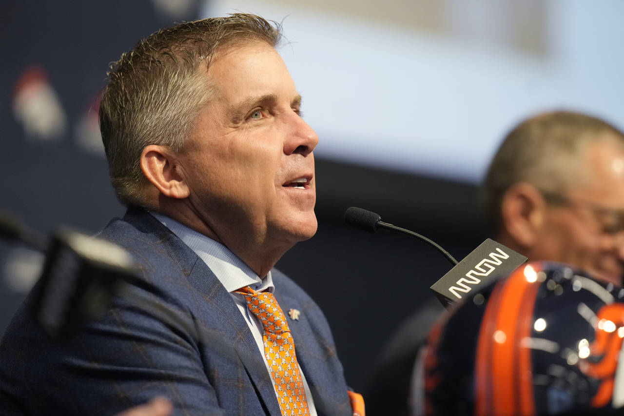 Denver Broncos new head coach Sean Payton is introduced during a news conference at the team's head...