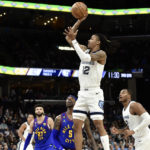 Morant scores 23, Grizzlies rout Nuggets in West showdown