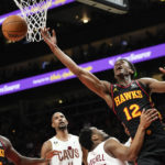 Hawks pull away in 1st half, rout Cavaliers 136-119