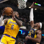James closes in on scoring record, Lakers rally past Pacers