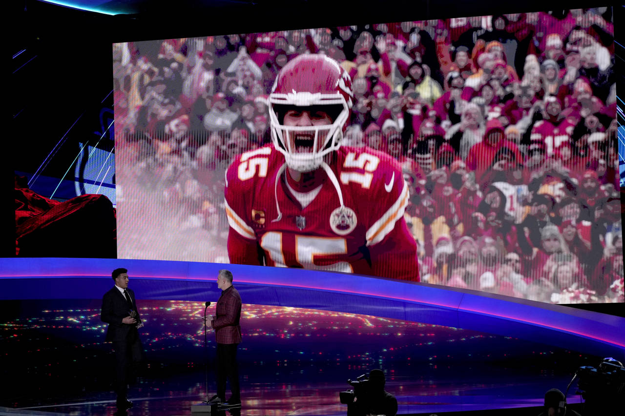 AP Most Valuable Player Kansas City Chiefs' Patrick Mahomes except his award on tape during the NFL...