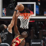 Young, Hunter pace Hawks past reeling Spurs 125-106